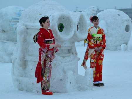 Walking along the street wearing kimono in the snowy scenery of Wakkanai